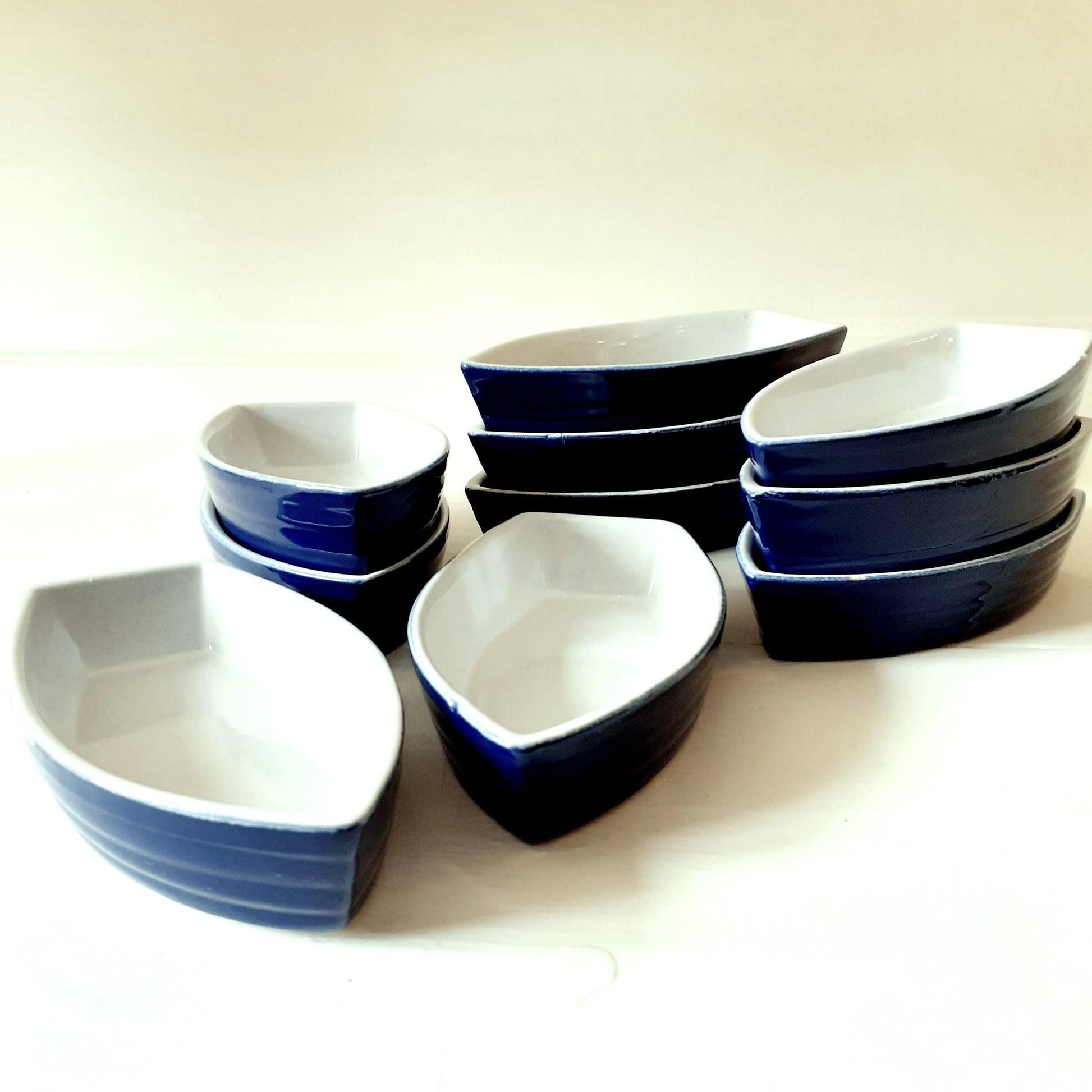 TEN Blue & White Boat Shaped Dishes from Tiggy & Pip - Just €98! Shop now at Tiggy and Pip