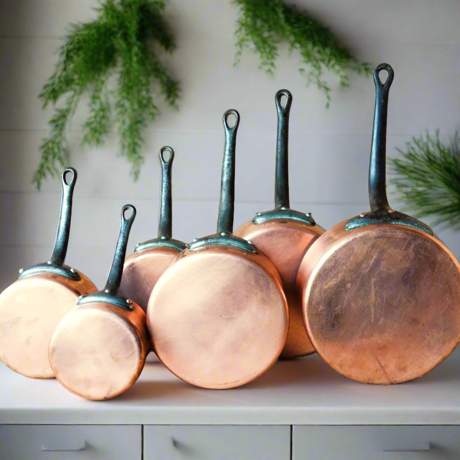 SIX Copper Pans with Cast Iron Handles from Tiggy & Pip - Just €280! Shop now at Tiggy and Pip