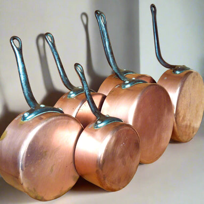 SIX Copper Pans with Cast Iron Handles from Tiggy & Pip - Just €280! Shop now at Tiggy and Pip